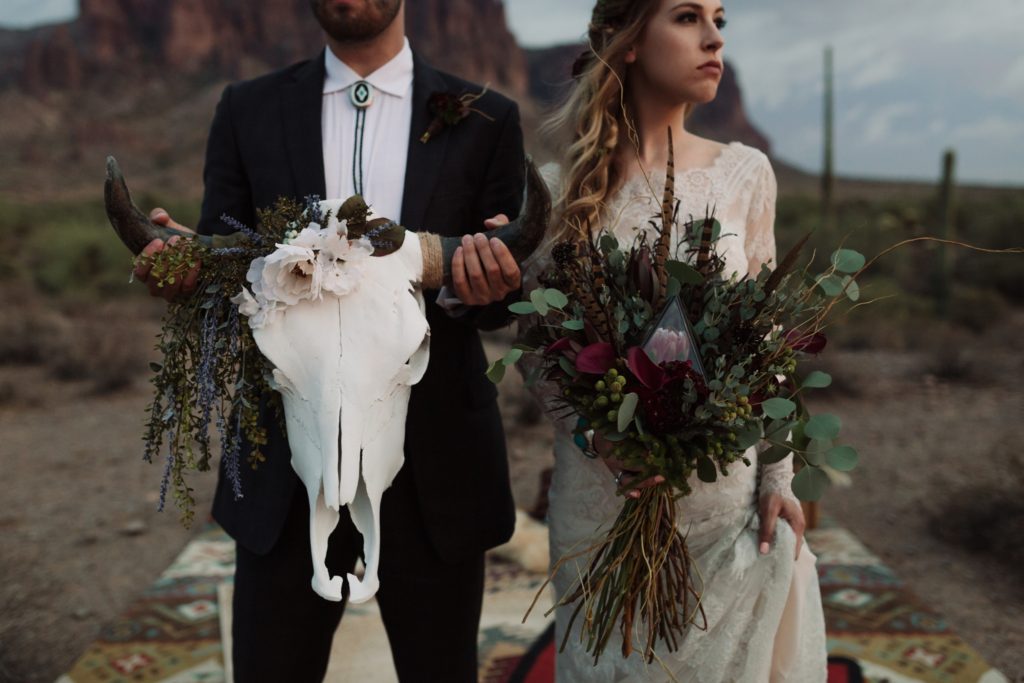 Superstition Mountain Elopement with skulls and terrarium in bouquet