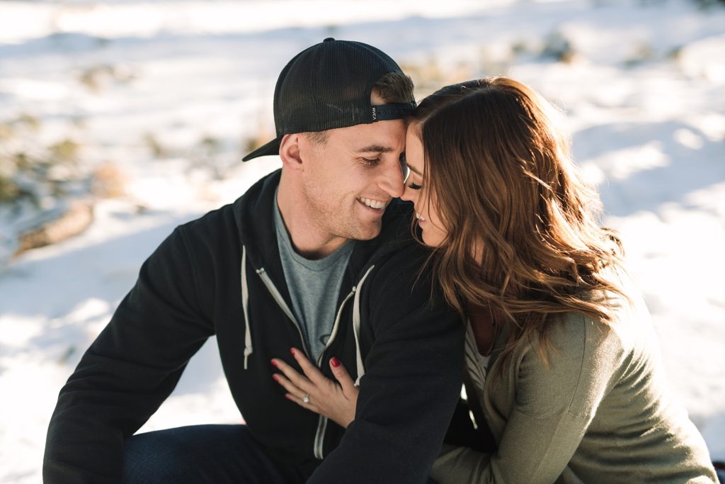 Payson engagement photos couple cuddles on blanket