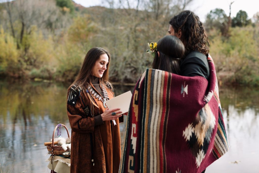 Sedona Elopement Couple wrapped in Tribal Blanket
