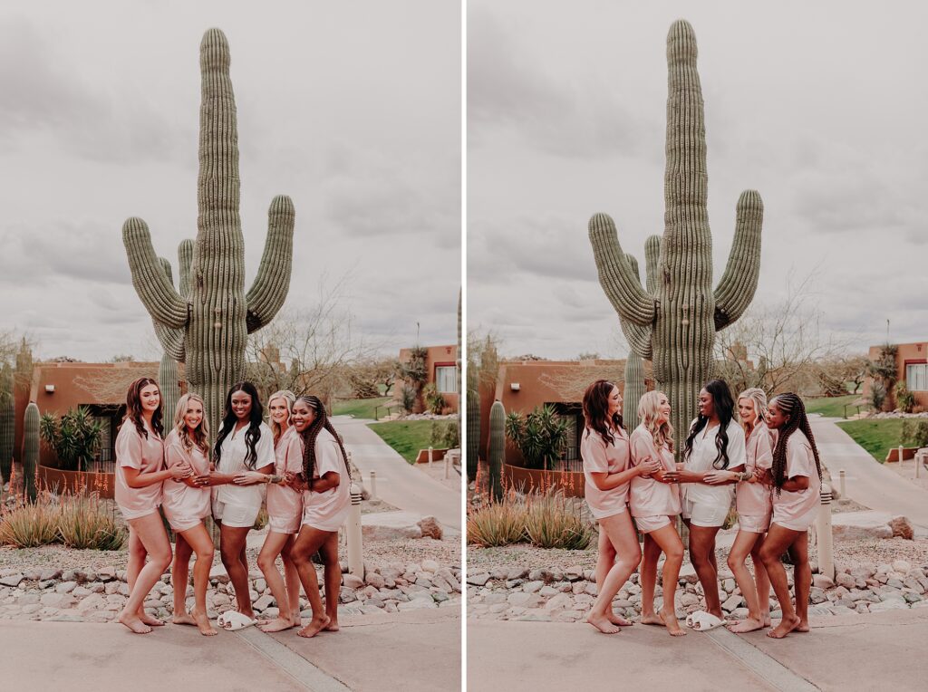 bride and bridesmaids wear matching pjs and stand in front of a saguaro 