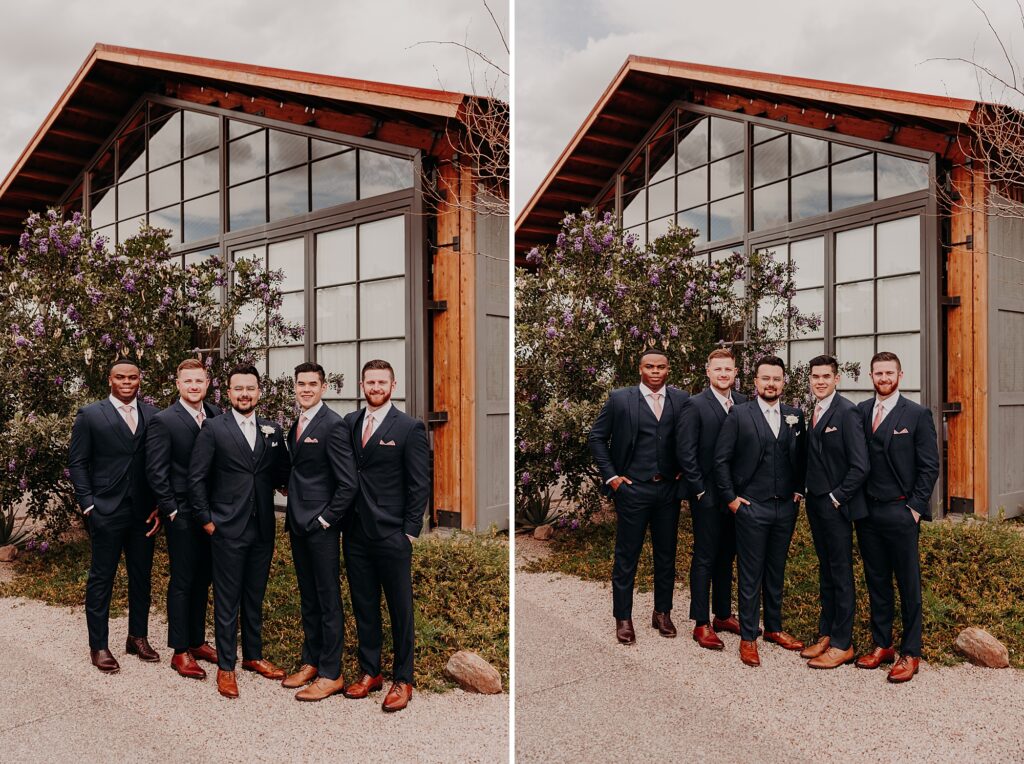 groomsmen pose for wedding photos