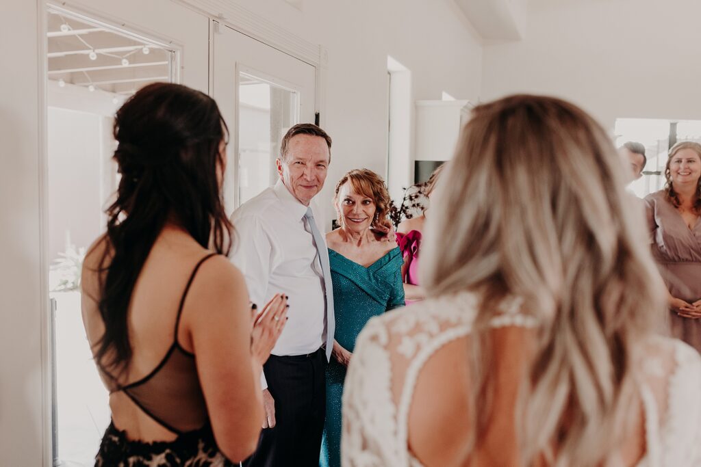family sees two brides for the first time in excitement