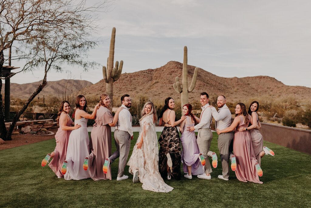 wedding party shows off rainbow converse