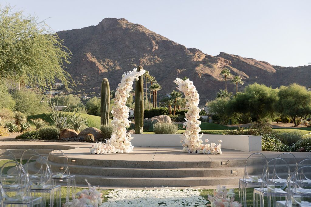 neutral floral wedding archway at mountain shadows