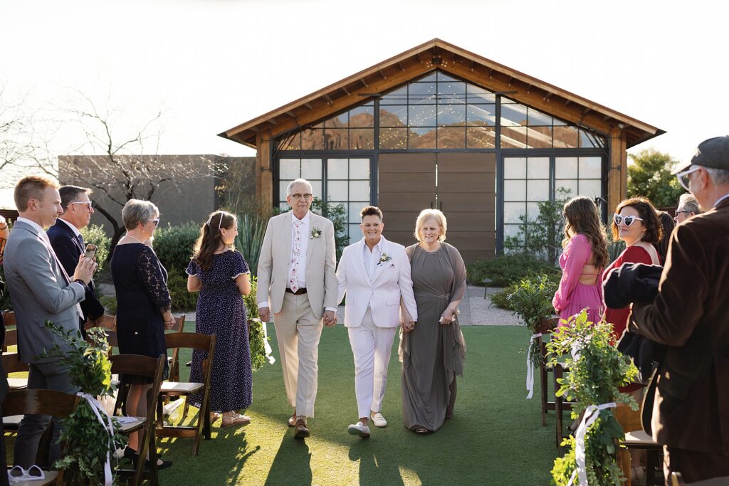 Bride walks down the aisle at the paseo wedding venue.