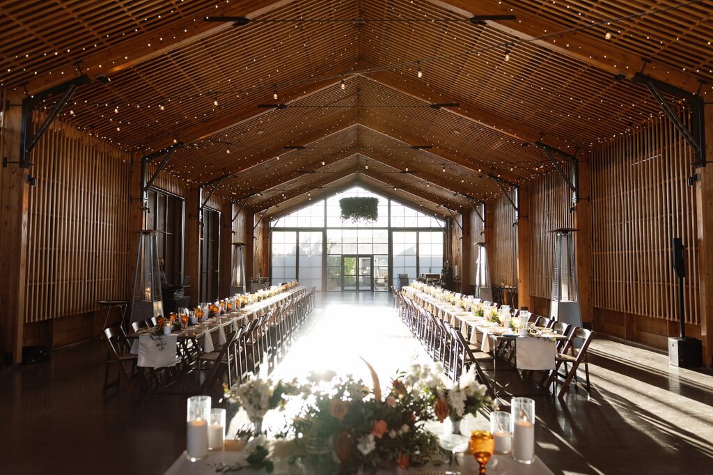 Wedding reception with farm tables at the paseo in apache junction.