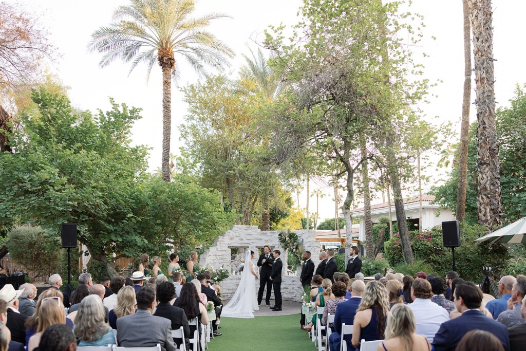wedding ceremony on the lawn at the scott hotel