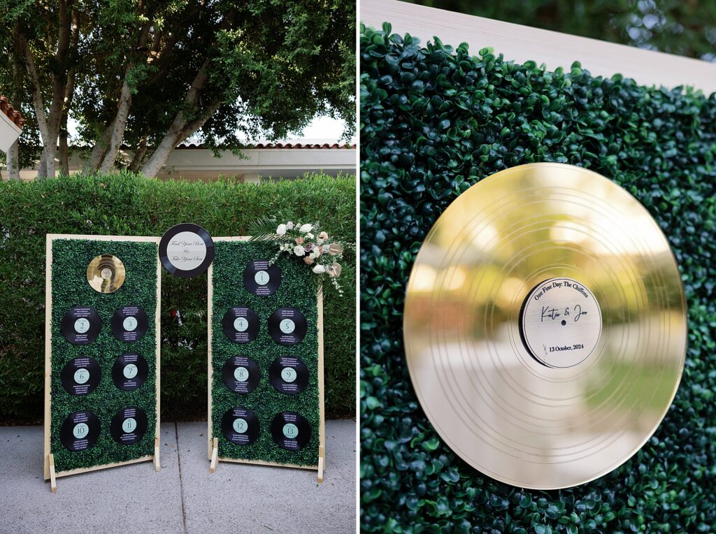 Wedding seating chart with gold vinyl records on green wall.