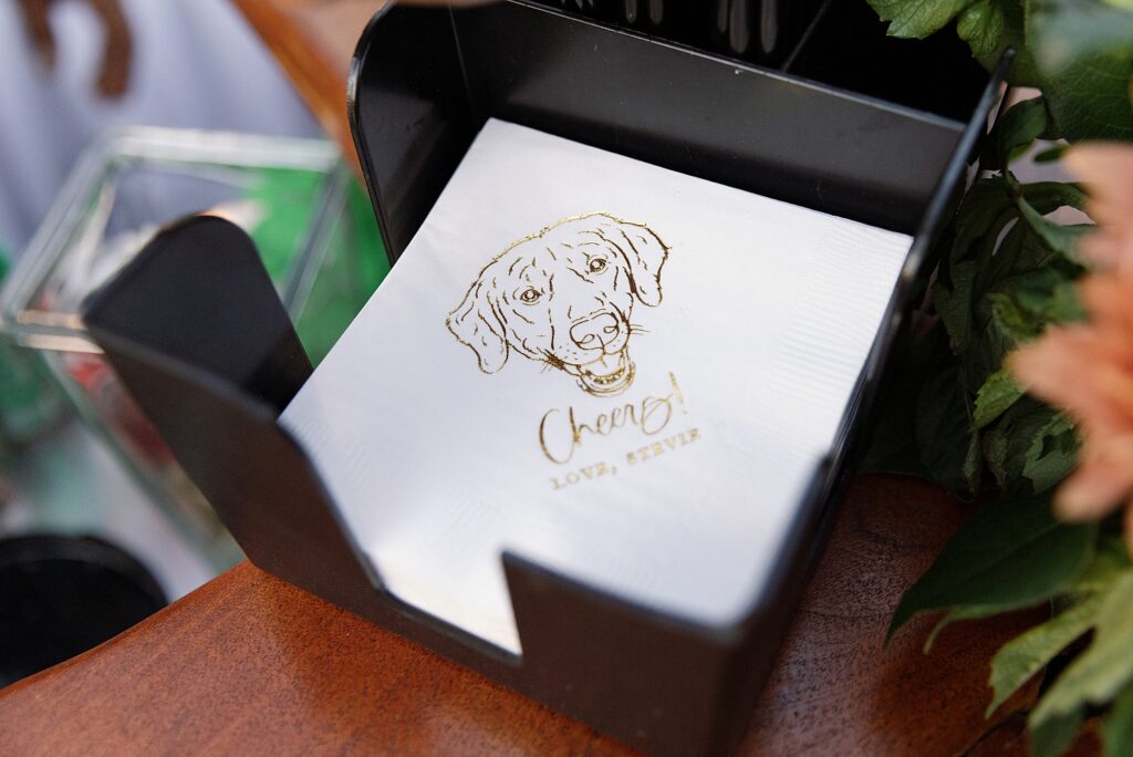 Custom bar napkins with portrait of dog at wedding reception.
