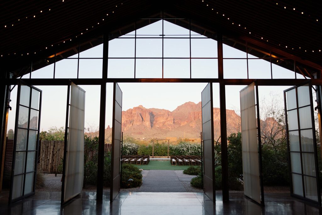 view of the superstition mountains from inside the paseo wedding venue