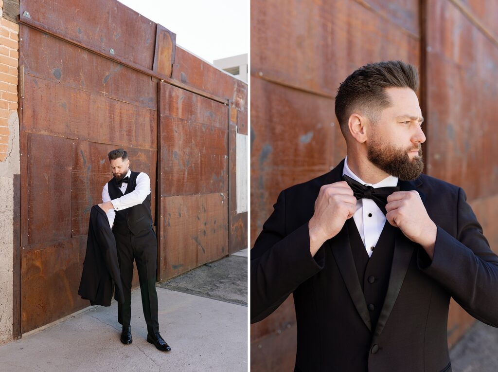 groom posed with hand on lapel in front of red industrial wall