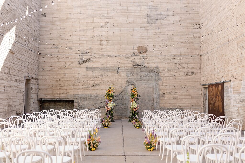 colorful flowers styled at wedding reception in industrial phoenix venue