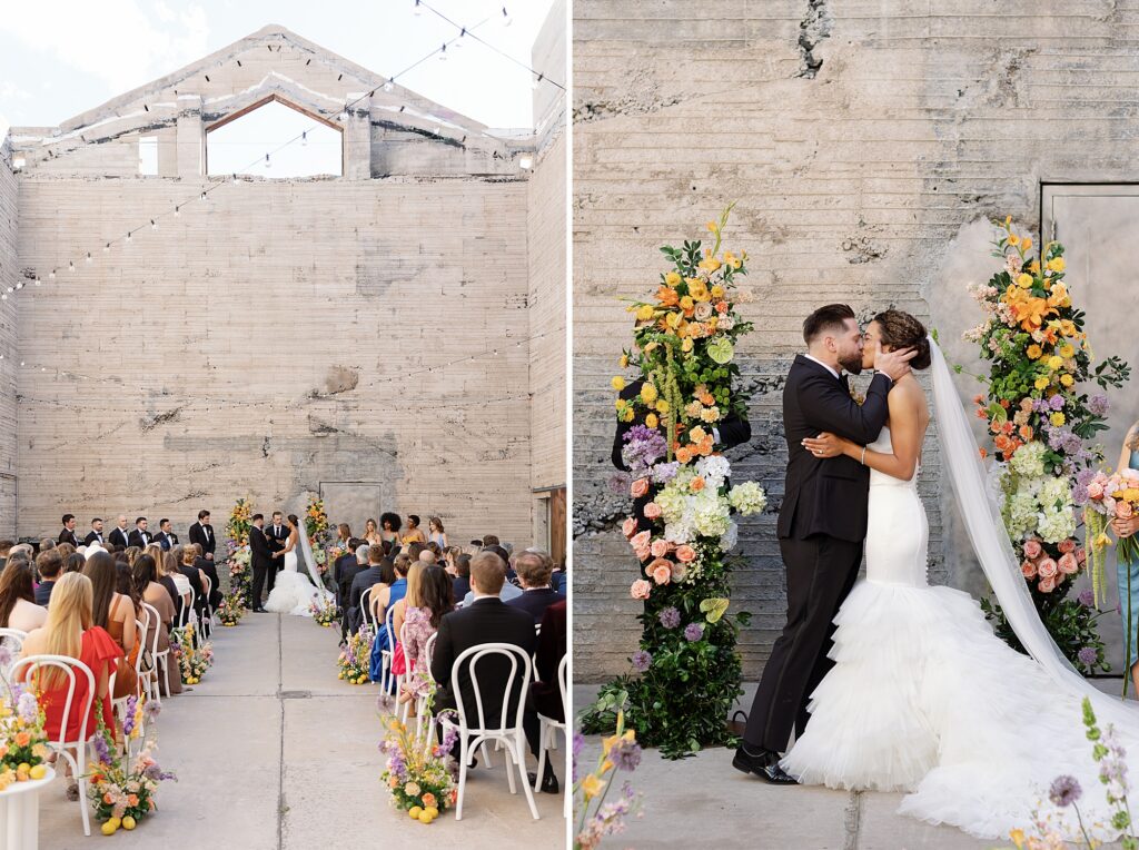 bride and groom kiss at wedding ceremony in industrial venue