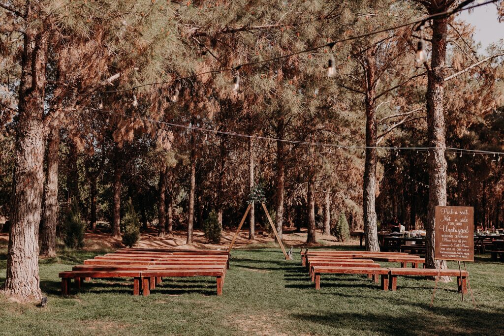 Ceremony space with triangular archway and benches