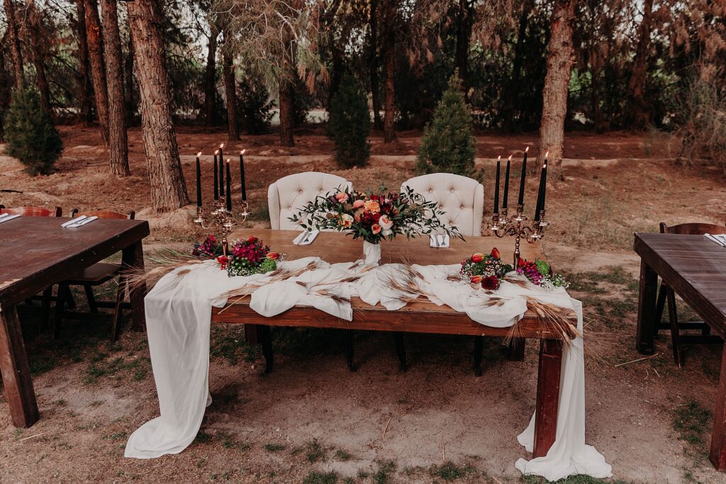 sweetheart table for bride and groom at wedding reception